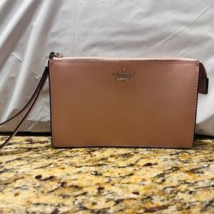 The Kate Spade Blush Leather Wristlet